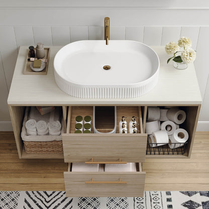 Compact wall hung vanity with oval white sink