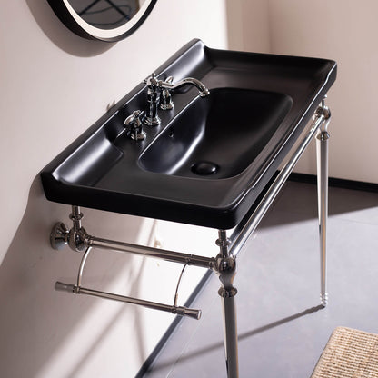 Console style bathroom sink with chrome legs and black ceramic basin   industrial chic look