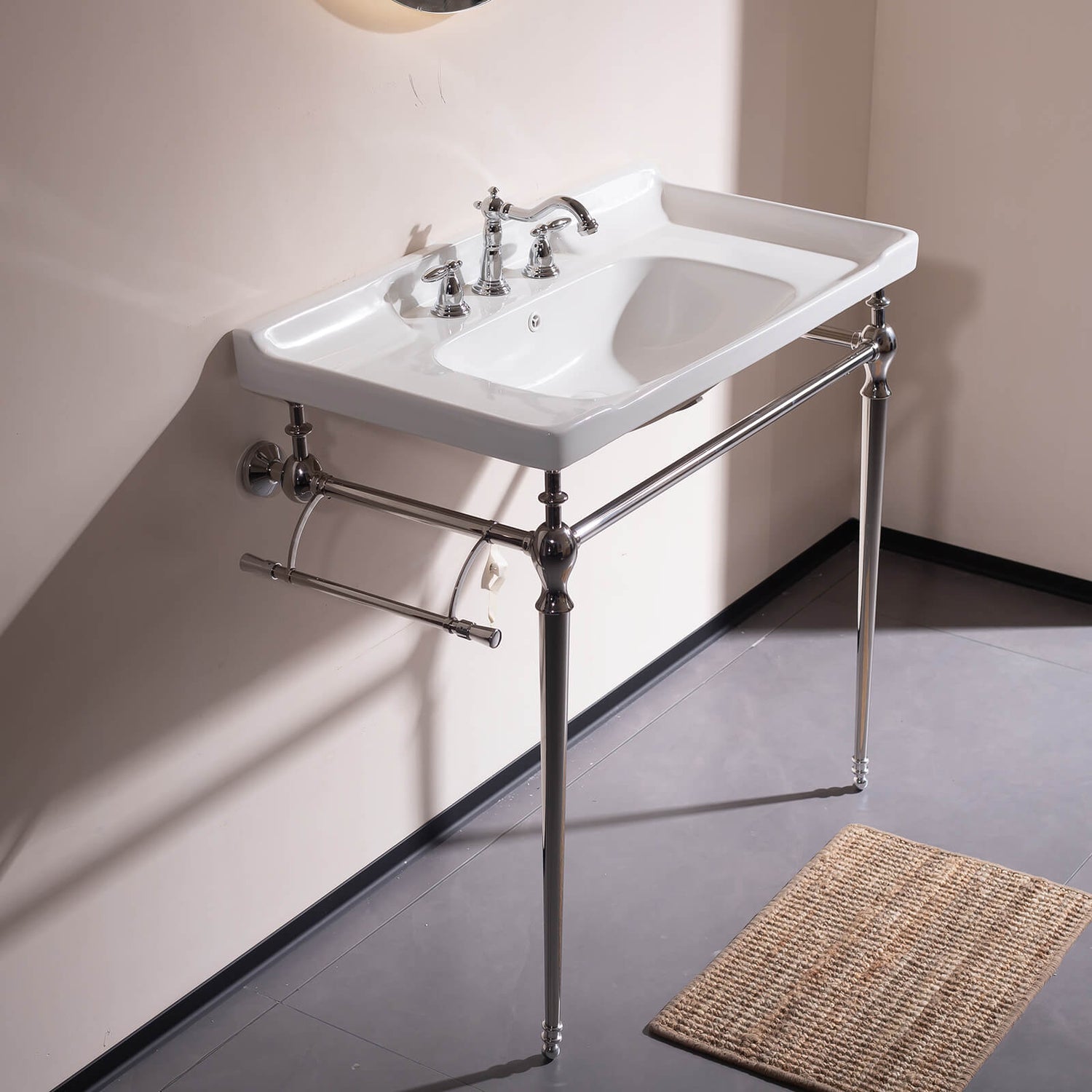 Console style bathroom sink with chrome legs and white ceramic basin   timeless elegant look