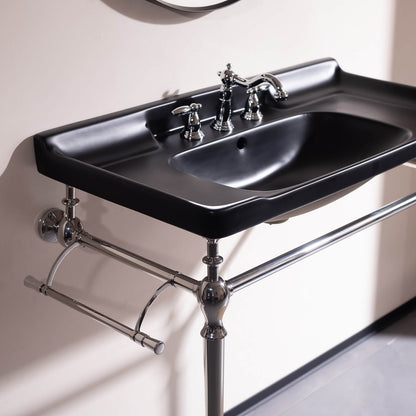 Contemporary black ceramic sink with chrome supports   freestanding vanity for modern bathrooms
