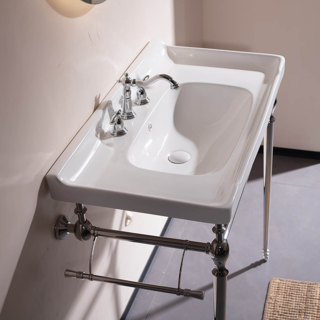 Contemporary white ceramic sink with chrome supports   freestanding vanity for small bathrooms