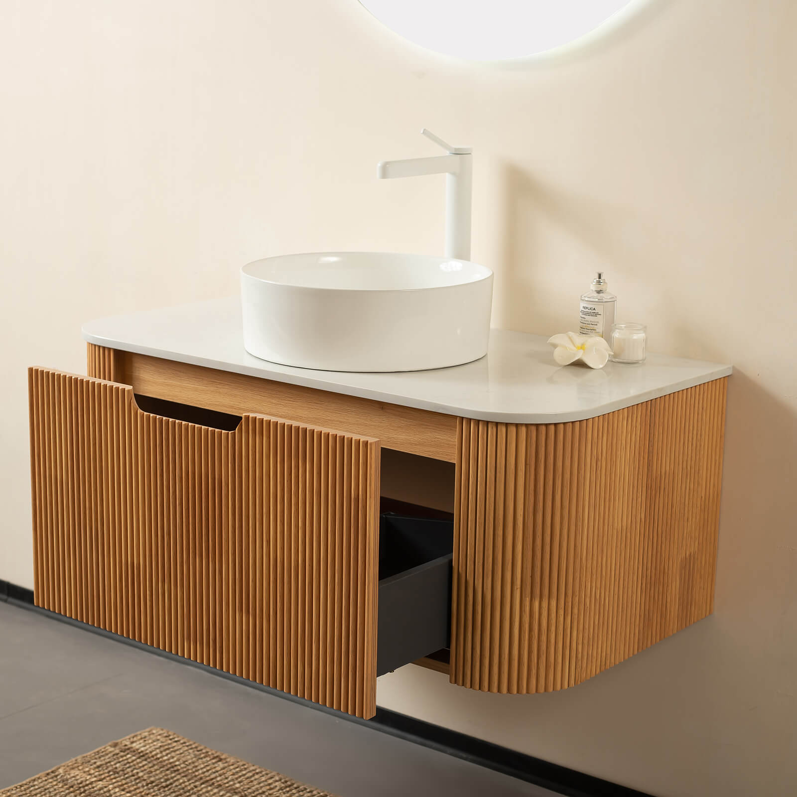 Contemporary wood look wall mounted vanity with marble countertop and ceramic sink