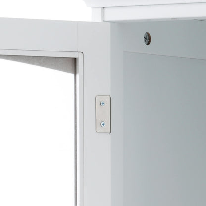 Detail of door opening of 63 inch tall white freestanding linen cabinet