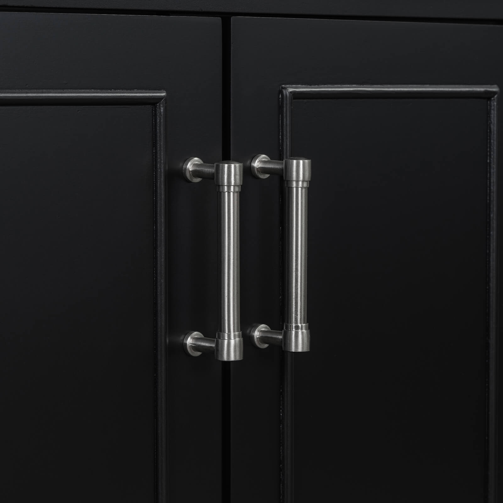 Detail of silver and white handles on 36 inch traditional black bathroom vanity with resin sink