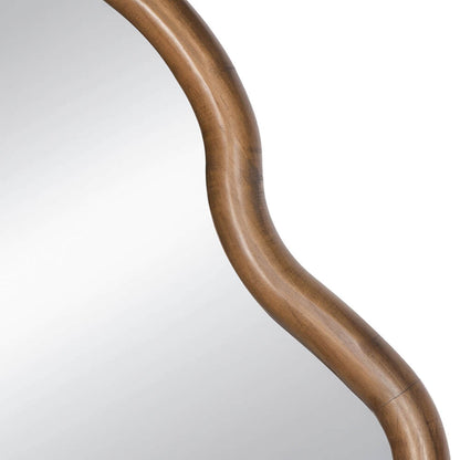 Detailed view of hand carved scalloped wooden mirror frame