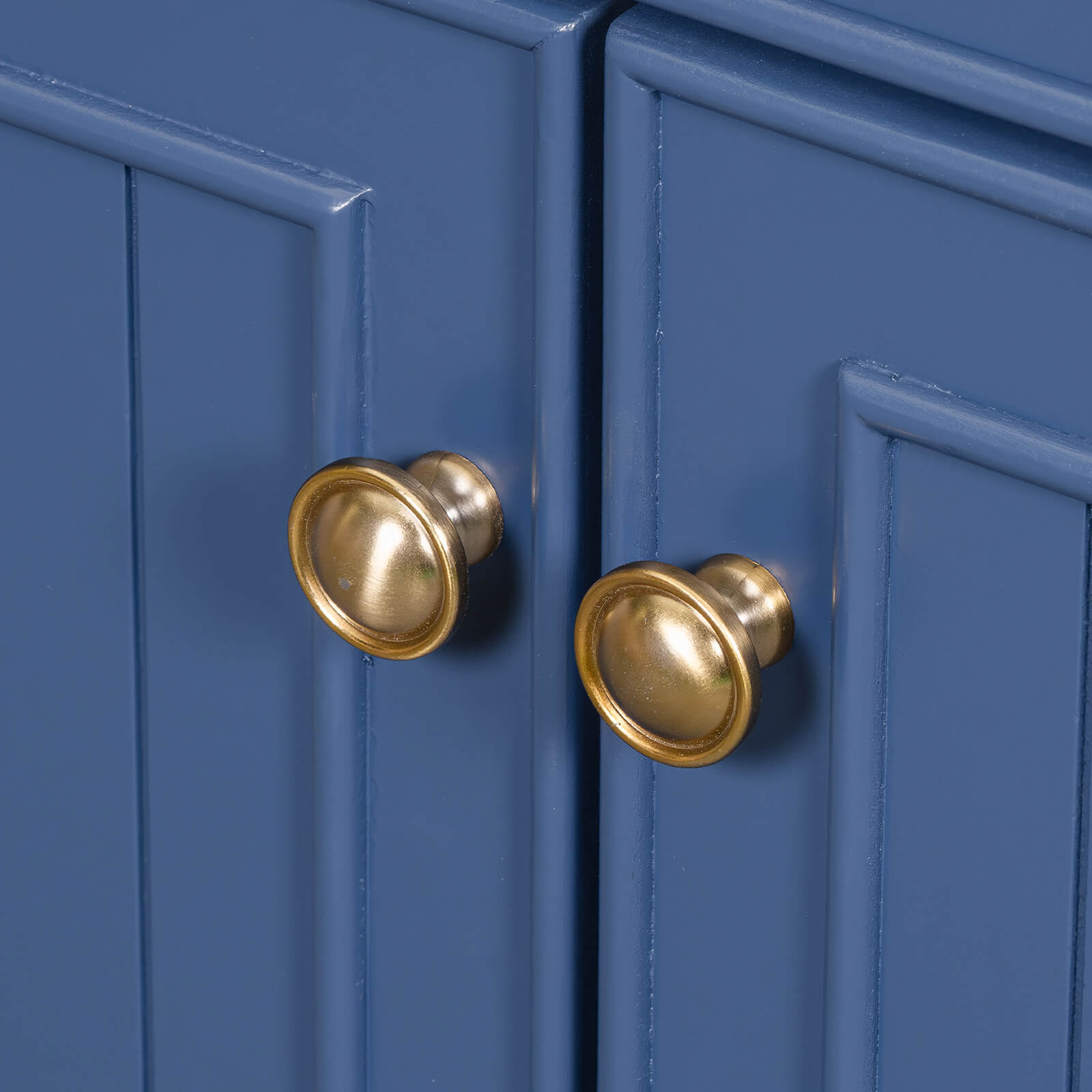 Elegant bathroom furniture piece with a navy finish and gold details