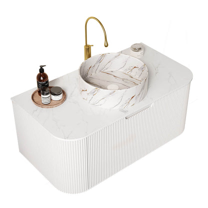 Floating white vanity with modern stone look ceramic basin
