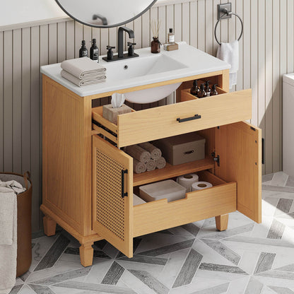 Freestanding vanity with rattan doors and organized shelf and drawer space