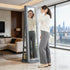 Full length mirror for outfit fitting in modern city view living room