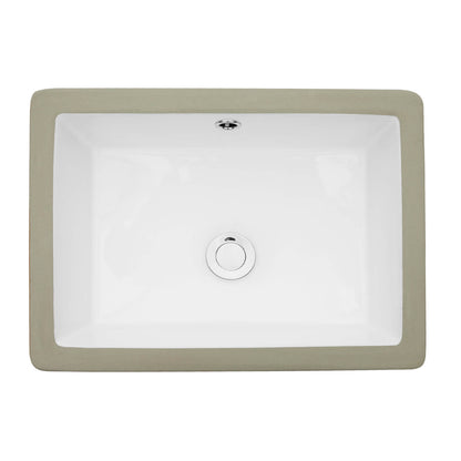 Glossy rectangular ceramic bathroom sink installed under vanity top