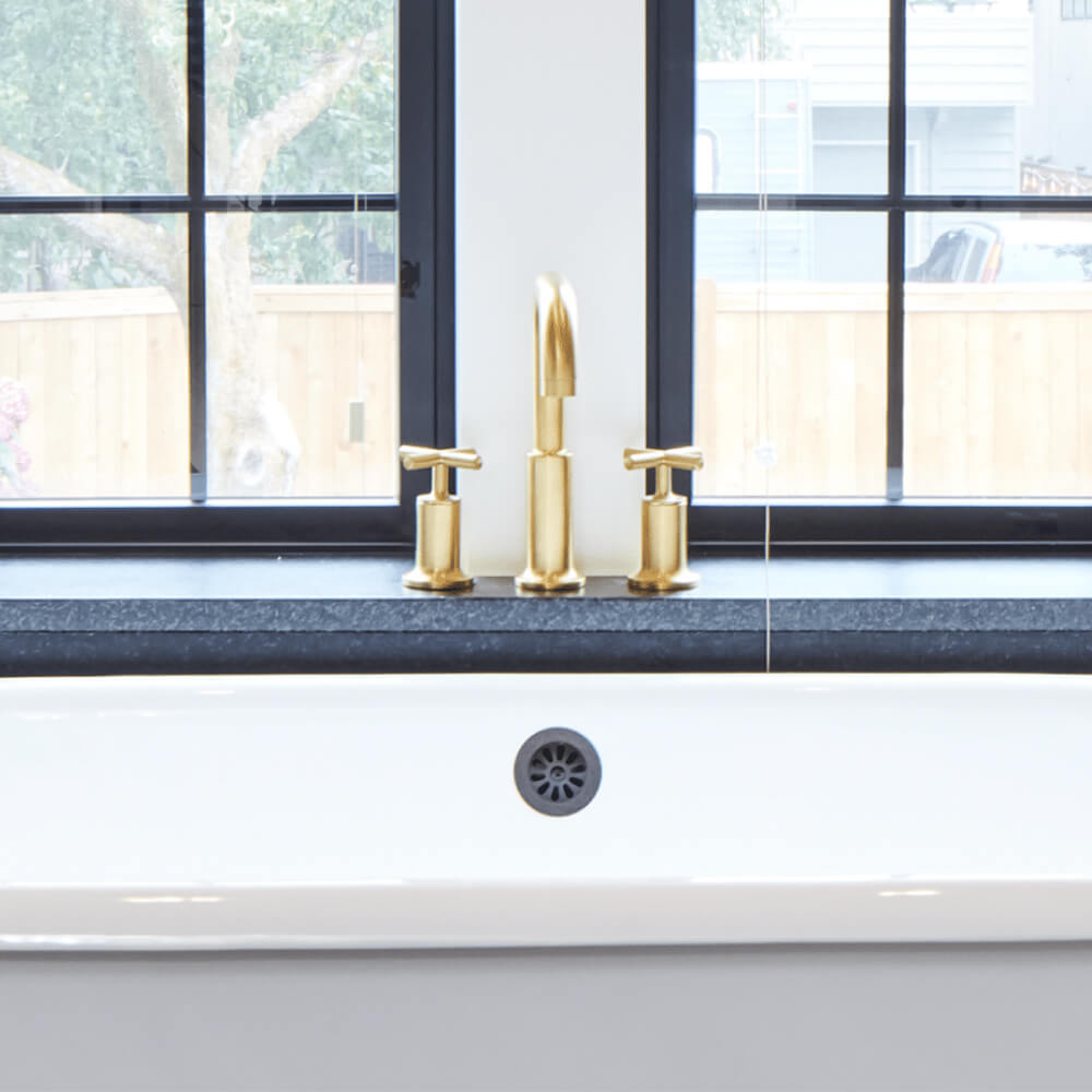 Installing a bathtub faucet near a window