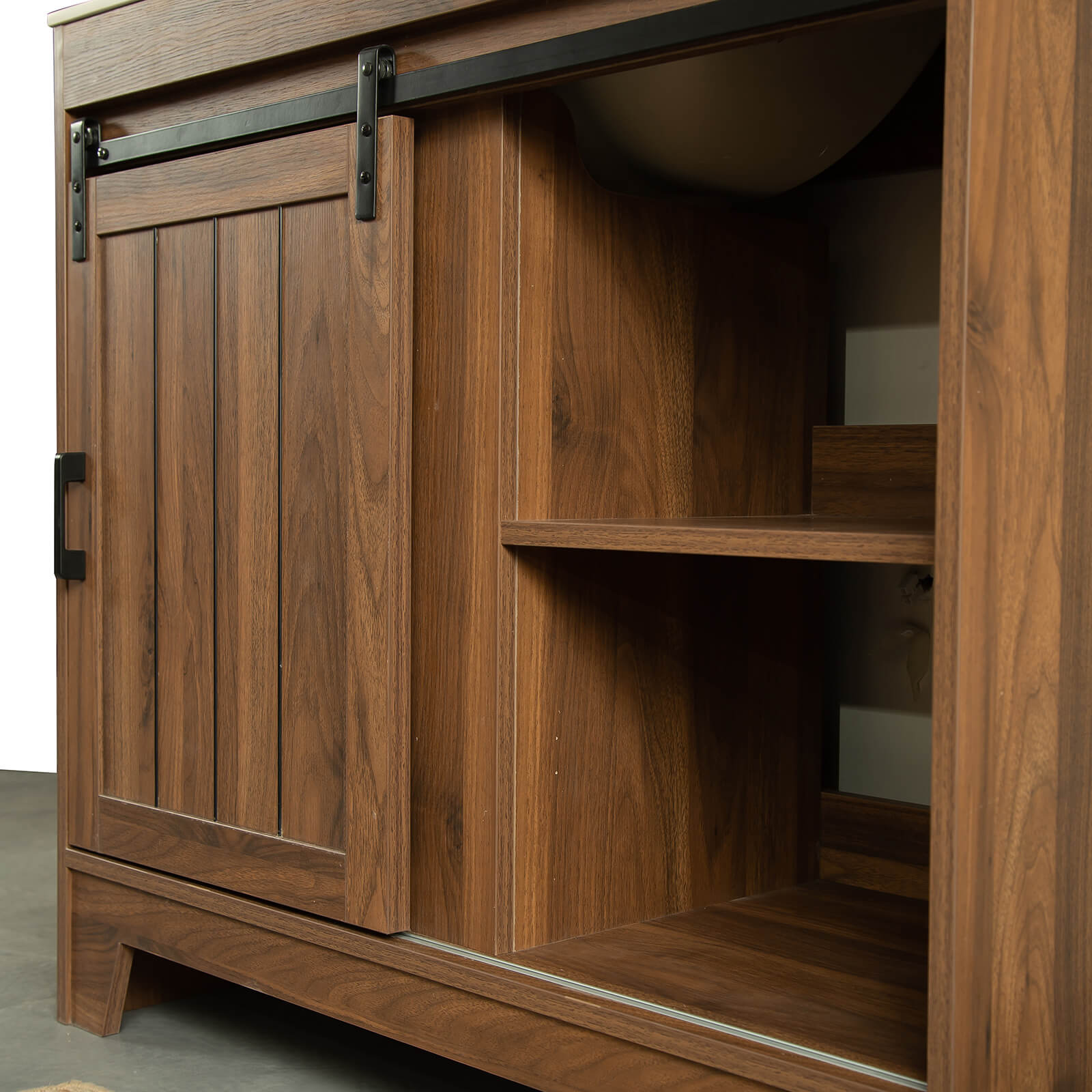 Matte black handles and tracks on farmhouse vanity door