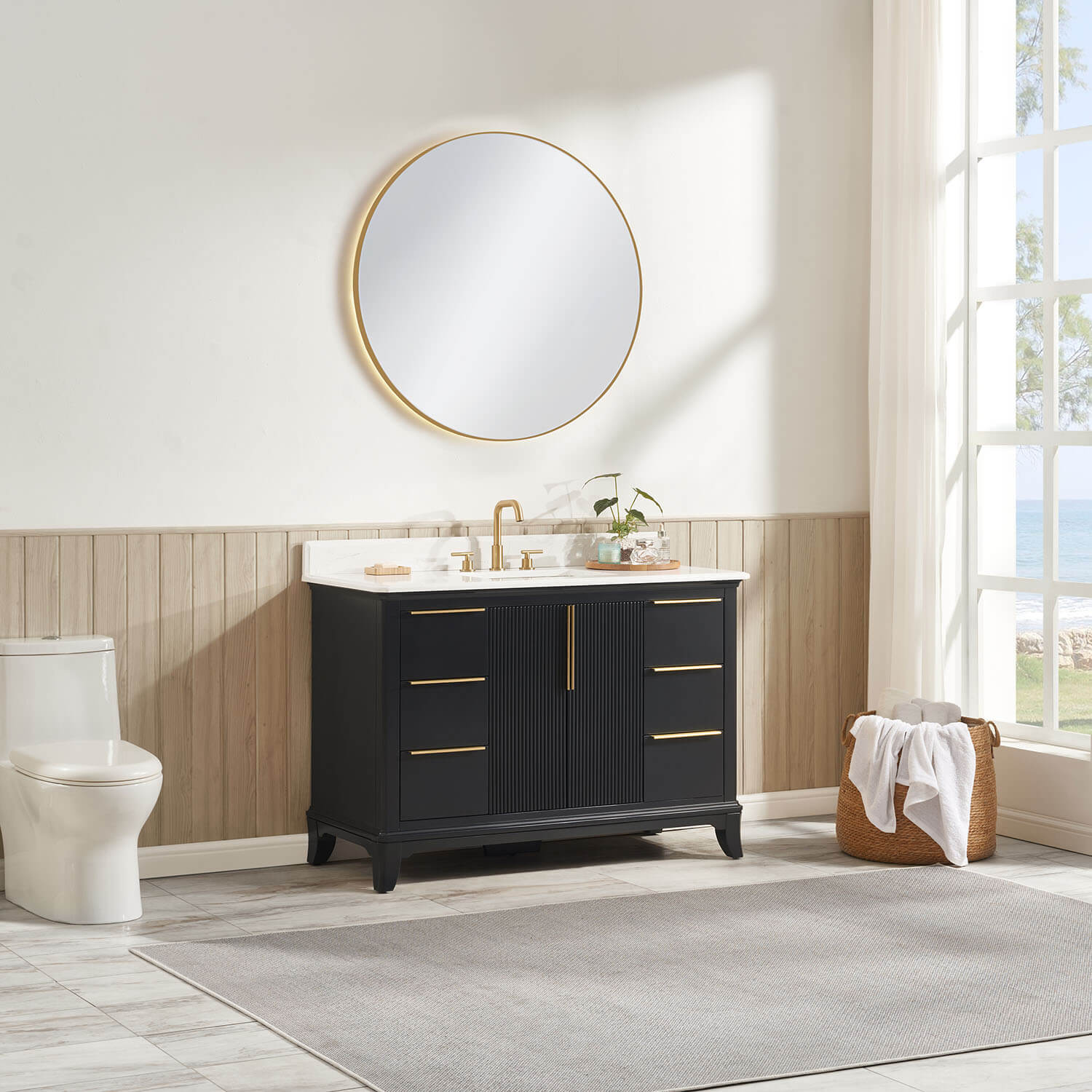 Midnight blue fluted cabinet doors with brushed gold handles