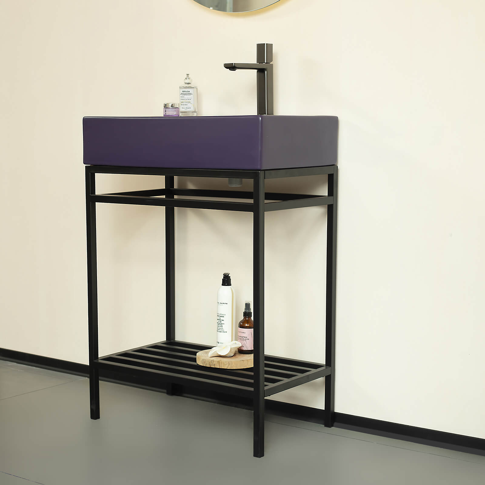 Modern bathroom sink with deep purple basin and open shelf
