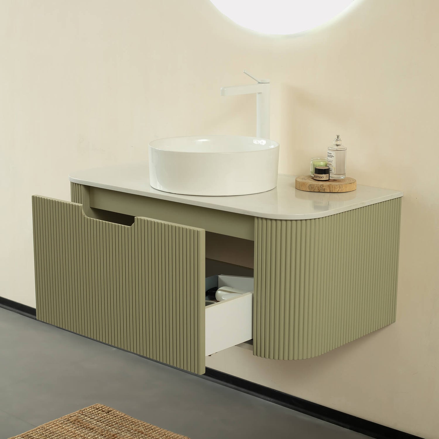 Modern forest green wall mounted vanity with marble countertop and vessel sink