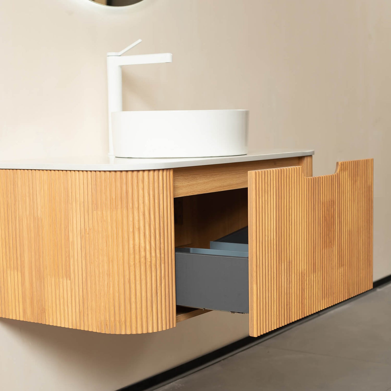 Modern wall mounted vanity with round ceramic sink and eco friendly construction