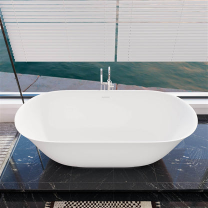 Modern white freestanding bathtub with a smooth solid surface finish