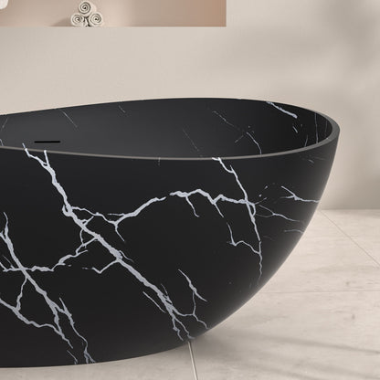 Modern black soaking tub with white marble texture detail