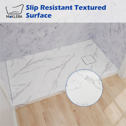 One piece marble look shower base with natural veining