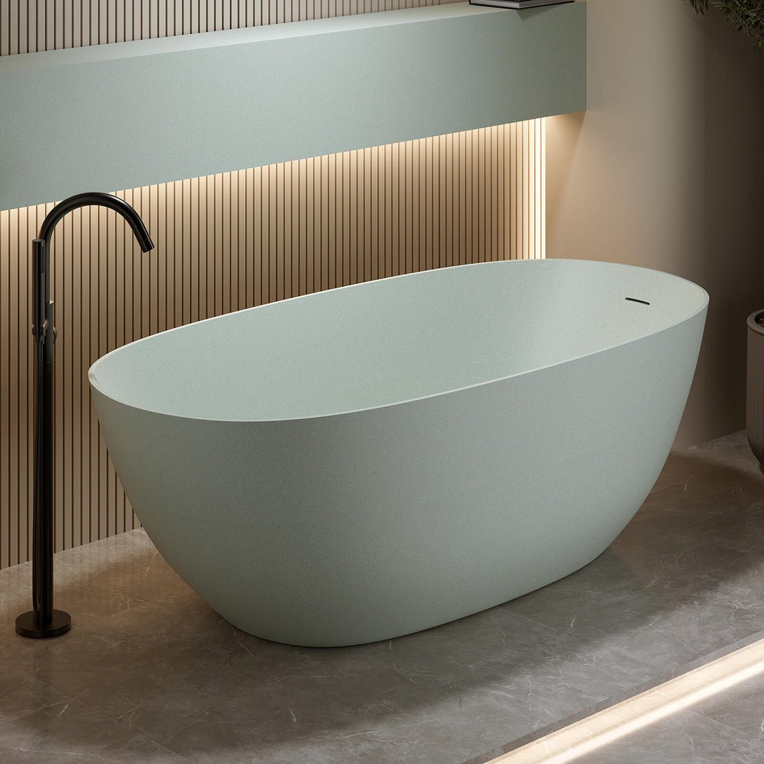 Oversized turquoise bathtub with ergonomic curved sides for maximum comfort