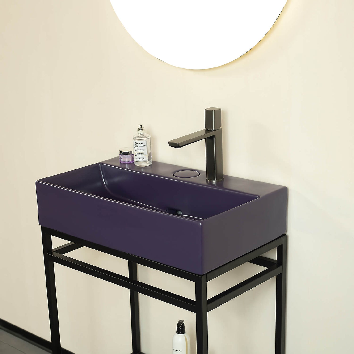 Shallow depth console sink in bold purple finish