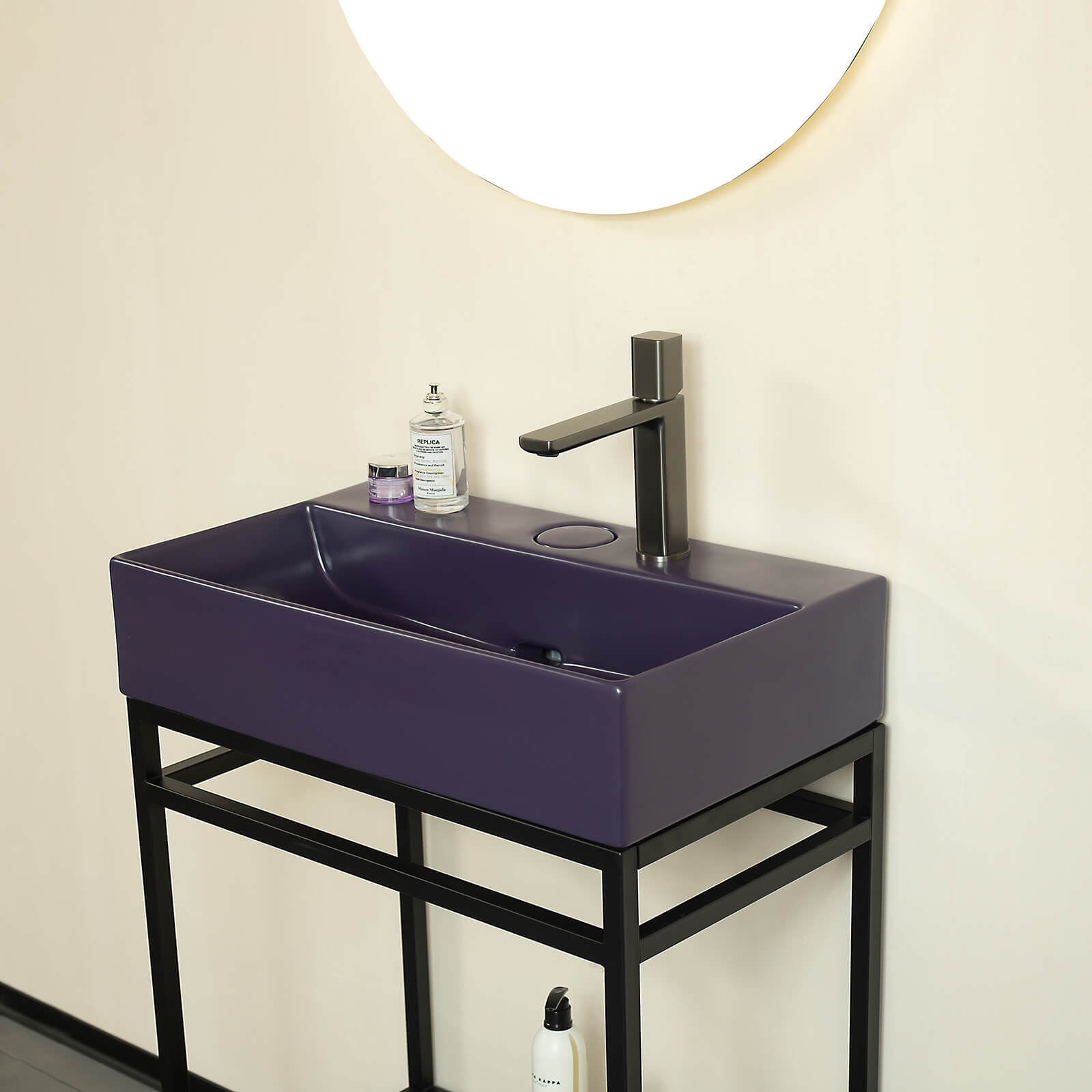 Shallow depth console sink in bold purple finish