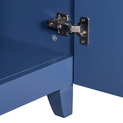 Soft close door detail on a 36 inch navy blue bathroom vanity cabinet with adjustable shelves