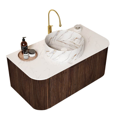 Space saving floating vanity with elegant stone veined vessel basin