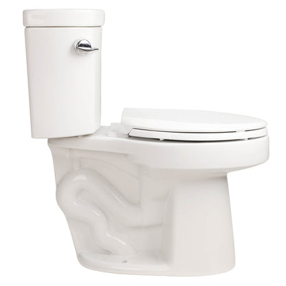 Two piece Tornado Flush toilet installed in minimalist bathroom