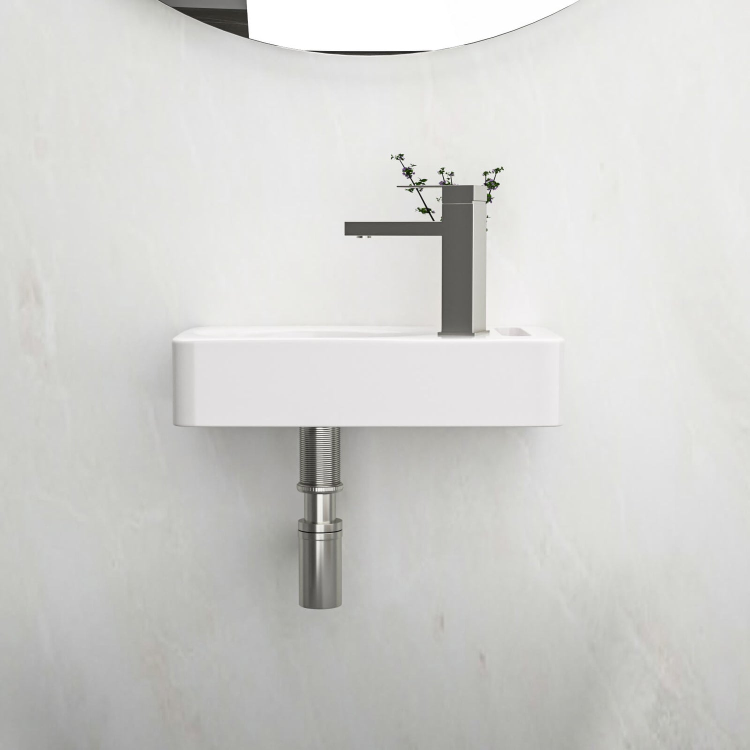 White bathroom sink with right side faucet hole and towel bar