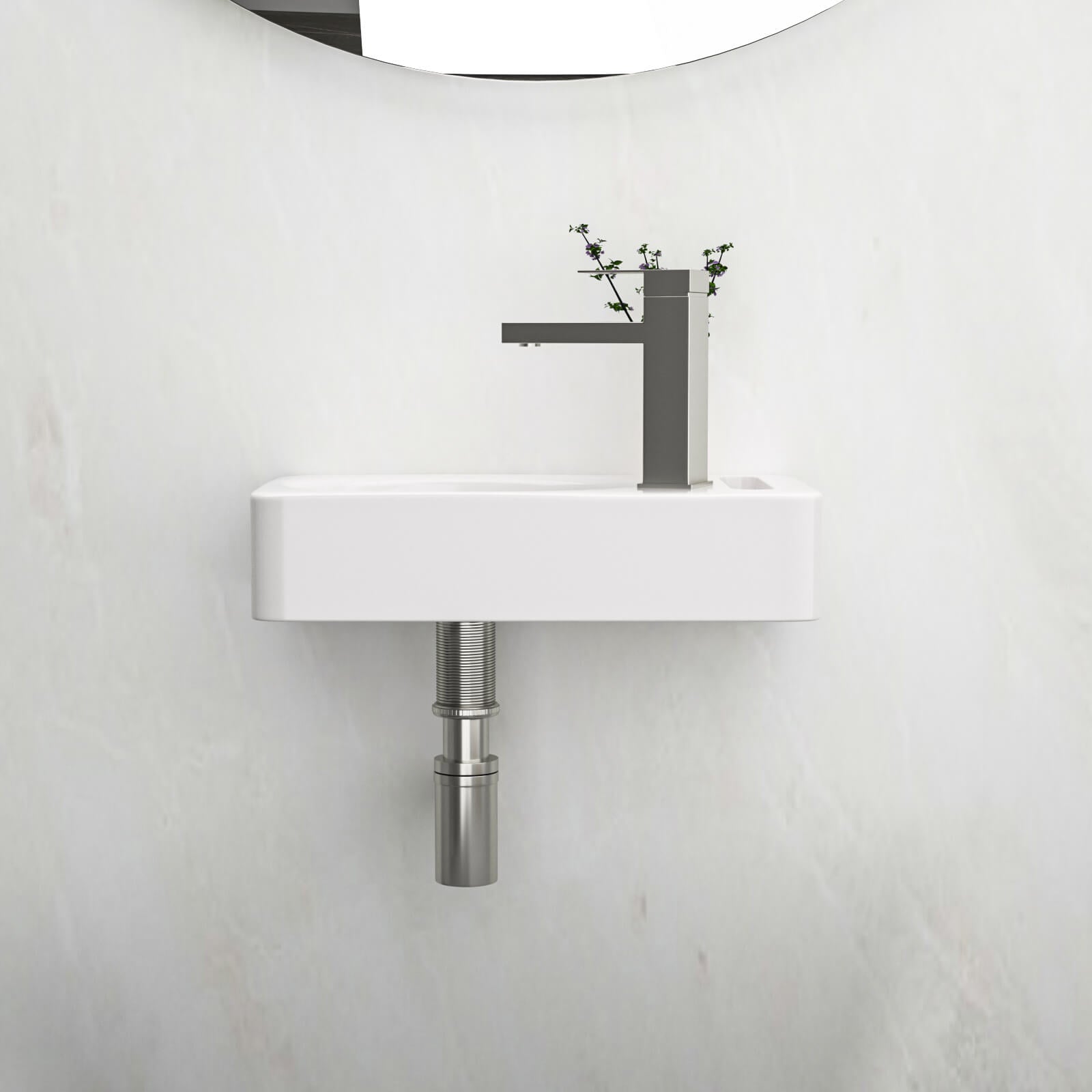 White bathroom sink with right side faucet hole and towel bar