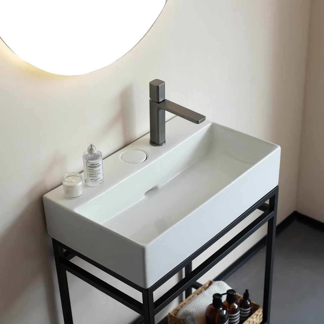 White rectangular sink with black powder coated base