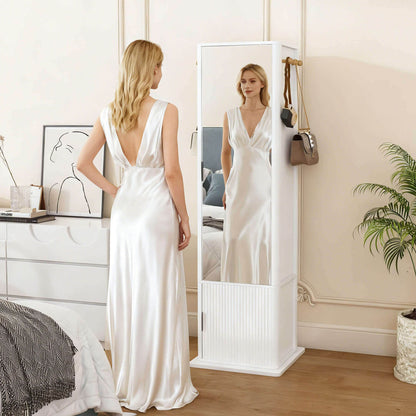 White rotating mirror cabinet for formal outfit fitting in bedroom