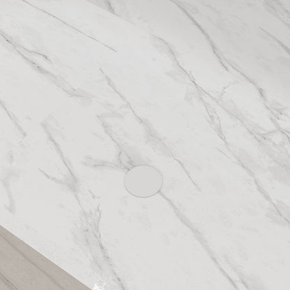 White stone resin bathtub with matching pop-up drain detail