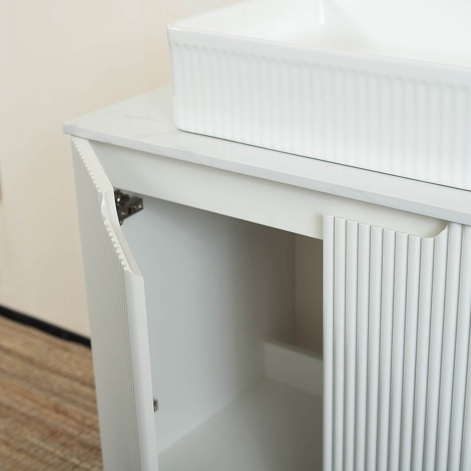close up of white fluted cabinet texture
