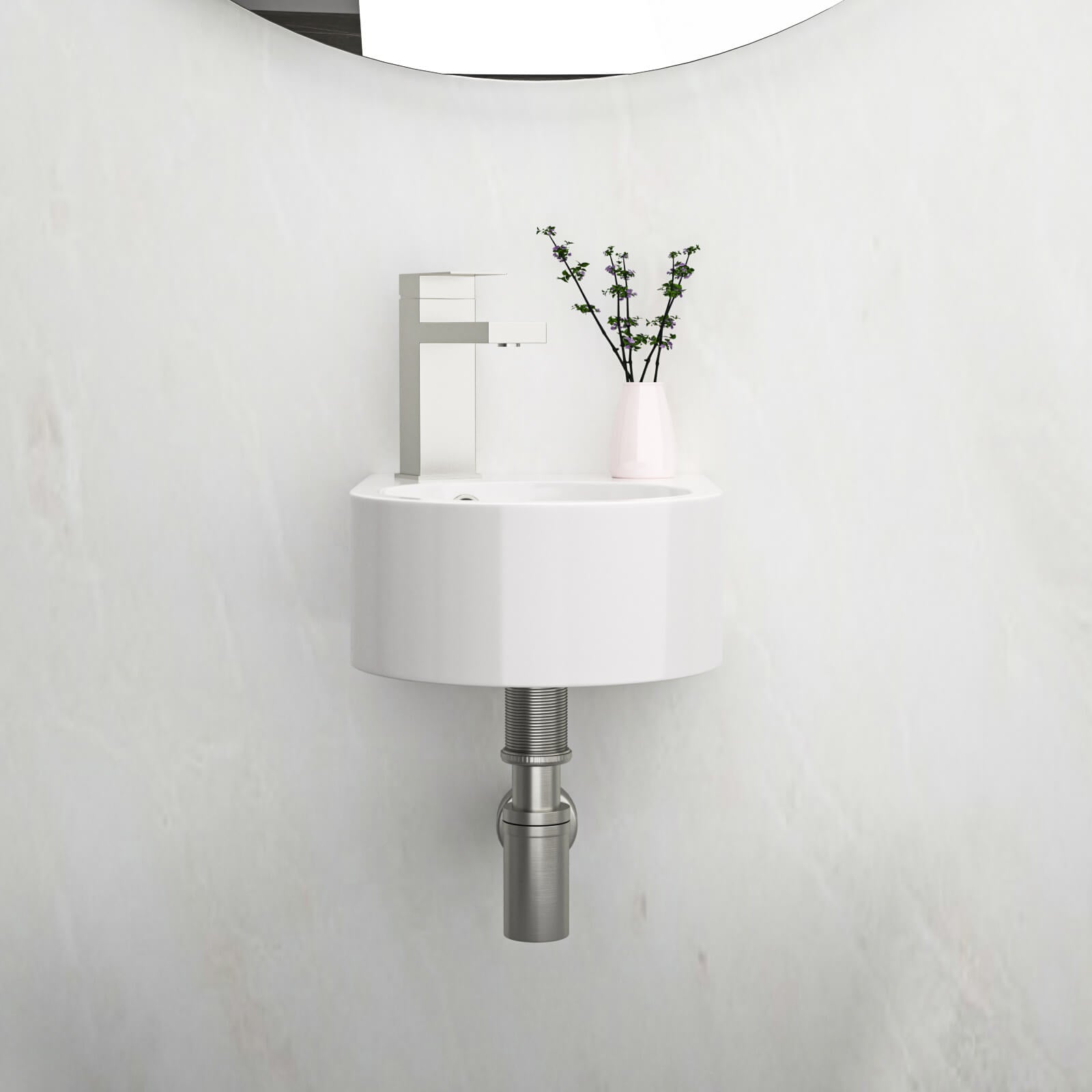 compact wall mounted basin with soft curved front edge