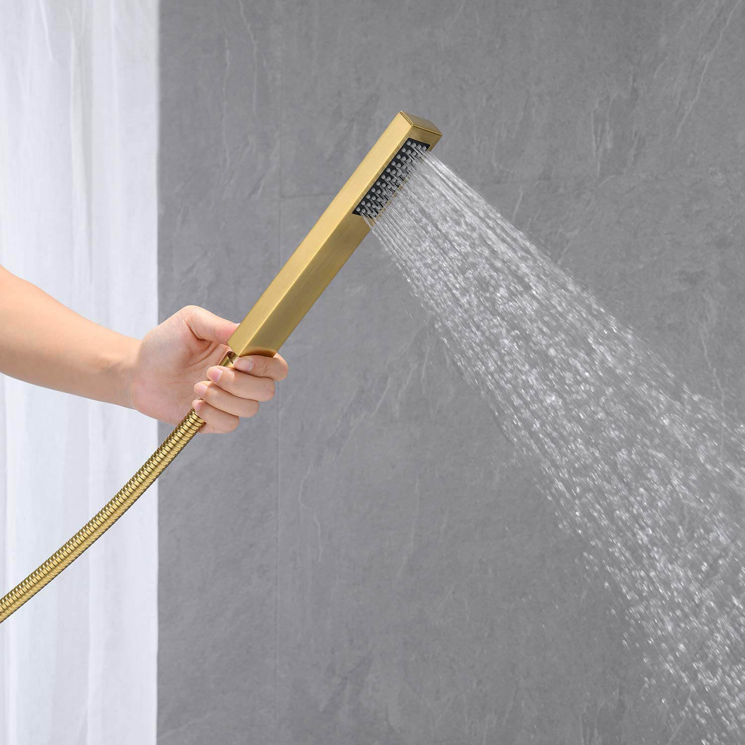 freestanding bathtub faucet with handheld shower and hose