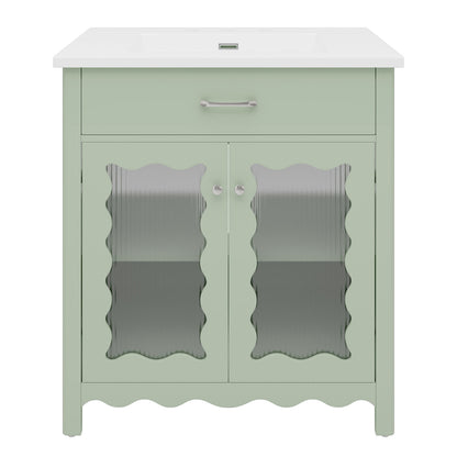 front view of sage green vanity with glass doors and ceramic sink