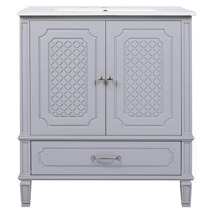 handcrafted gray vanity with subtle carved front panel accents