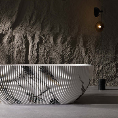 luxury freestanding bathtub with ink marble veining