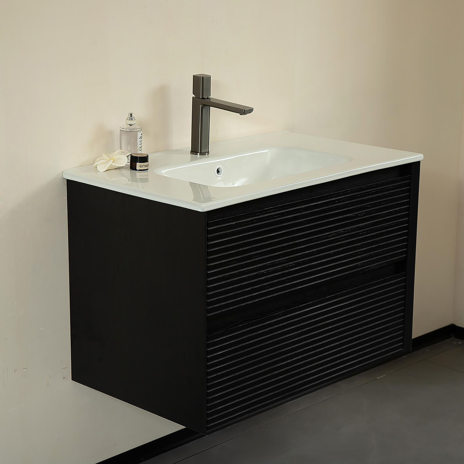 matte black wall mounted vanity with white ceramic sink