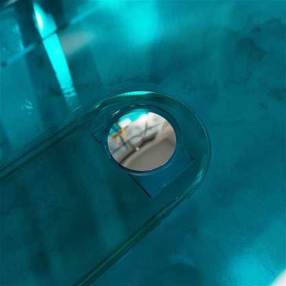modern freestanding teal resin soaking tub with center drain