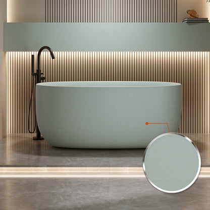 spa style freestanding bathtub with vibrant turquoise exterior