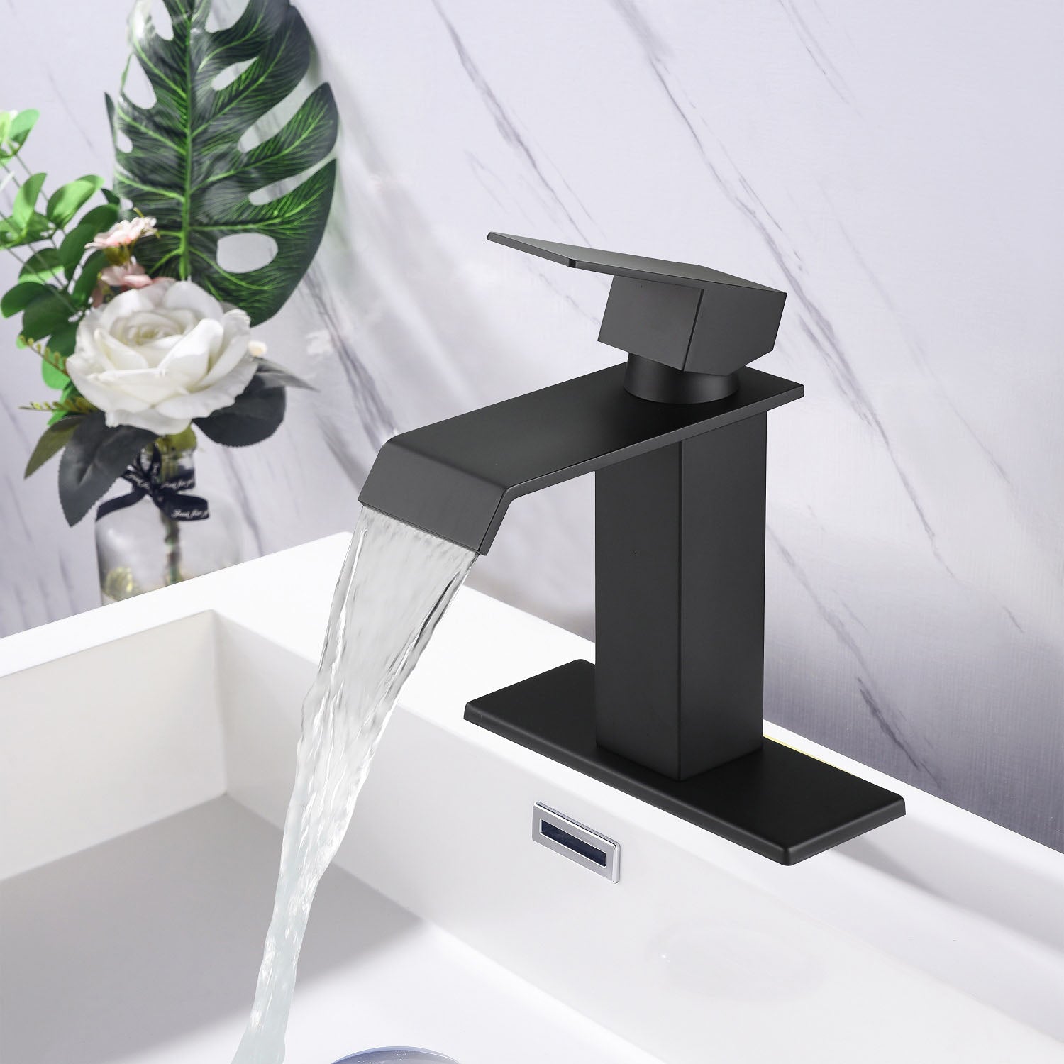 water flow from Matte Black Stainless Steel Single Handle Waterfall Bathroom Faucet