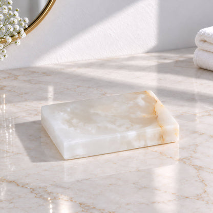 Rectangular white jade marble soap dish with a recessed surface and golden veining