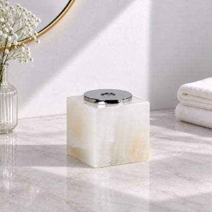 White jade marble reed diffuser bottle with a polished chrome top for bathroom decor