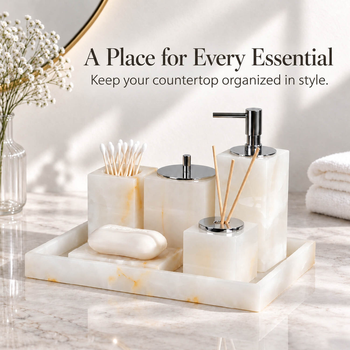White marble bathroom countertop organizer with six coordinated accessories on a vanity tray
