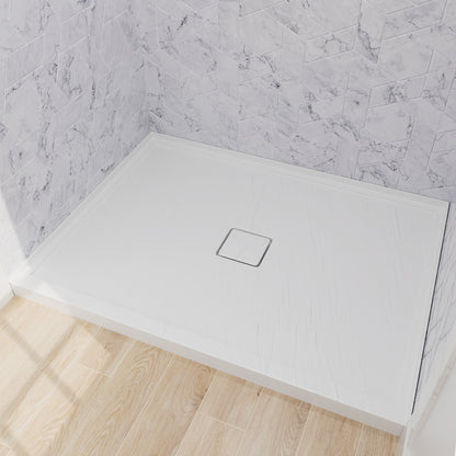 white acrylic shower base with textured anti-slip surface and center drain