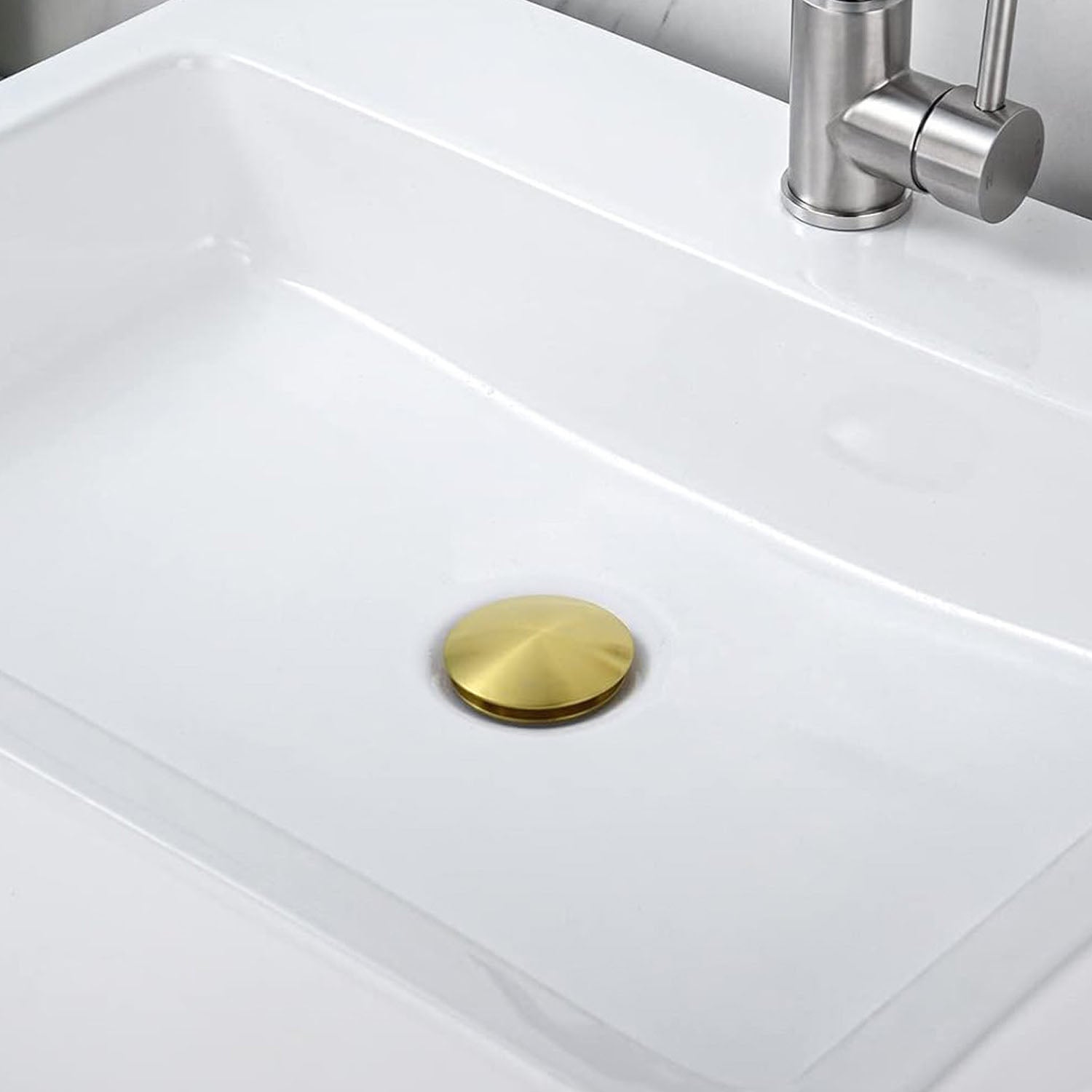 white sink with a Brushed Gold Bathroom Sink Pop Up Drain